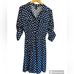 Millinium knee length collared blue polka dot dress. Elastic waist, w/ tie. Sz L